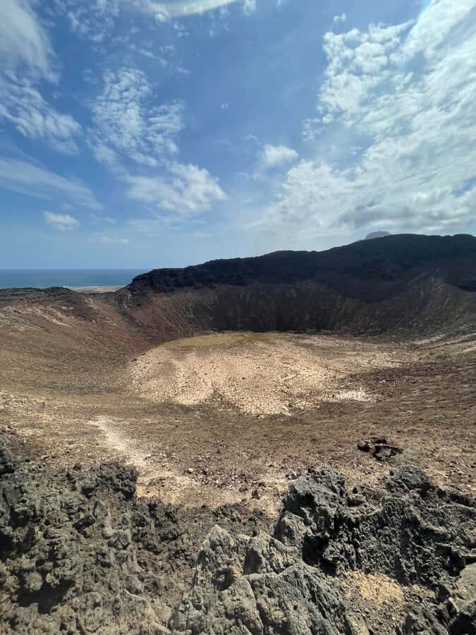 Hike Volcano Viana - The walk to the crater: volcanic-rock steps and a dry, open-feel terrain
